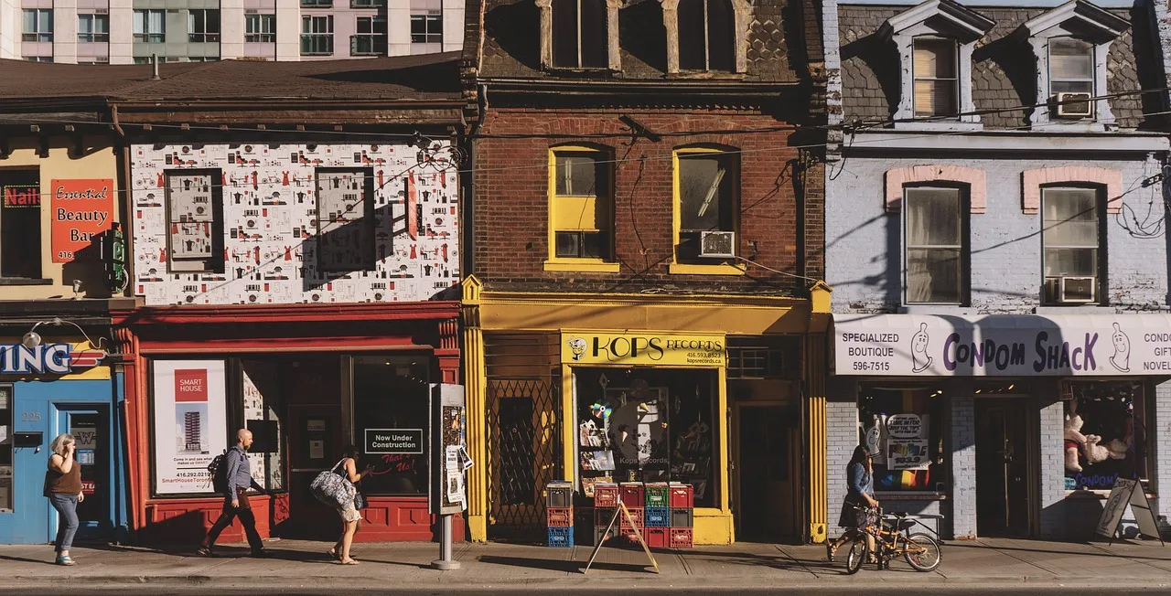 architecture, building, city, commerce, daylight, facade, house, outdoors, pavement, people, road, shopping, stock, street, tourism, town, travel, urban, vehicle, brown city, brown travel, brown house, brown road, brown shopping, brown building, brown street, brown shop, commerce, commerce, commerce, commerce, commerce, house. Chamber of commerce local promotion: membership benefits