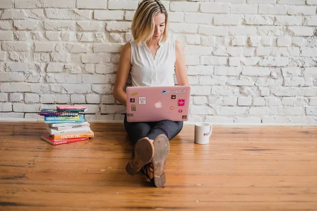 influencer, writing, girl, woman, typing, on computer, content marketing, typing on floor, written, words, handwriting, brown computer, brown laptop, brown marketing, brown writing, influencer, influencer, influencer, influencer, writing, writing, writing, writing, writing, typing, content marketing. Common Small Business Content Marketing Questions