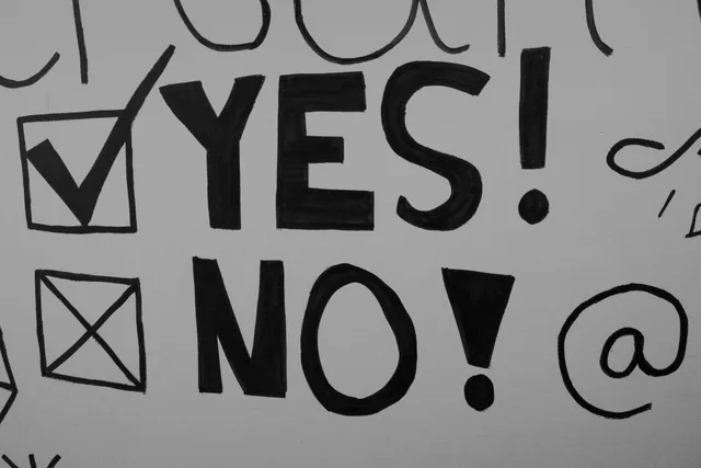 Black and white artistic text with checkboxes featuring 'YES' and 'NO' in bold typography style. Small Business Email Marketing Mistakes: Operational Fixes
