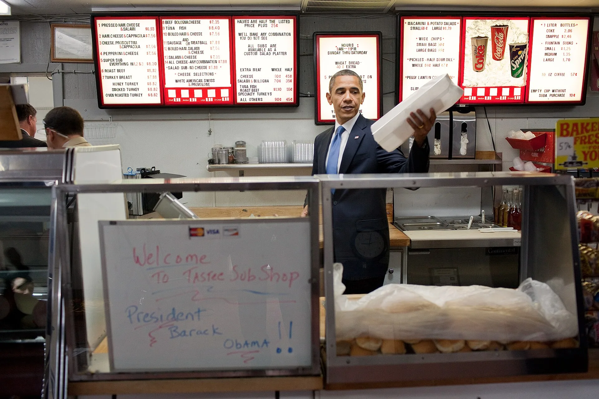 President Barack Obama picks up his sub after meeting with five small business owners at Tastee Sub Shop in Edison, N.J., July 28, 2010. The President visited Edison to discuss the economy and urge Congress to pass support for small businesses. (Official White House Photo by Pete Souza). What Separates the Strong Small Business Marketing Strategy Examples From the Weak