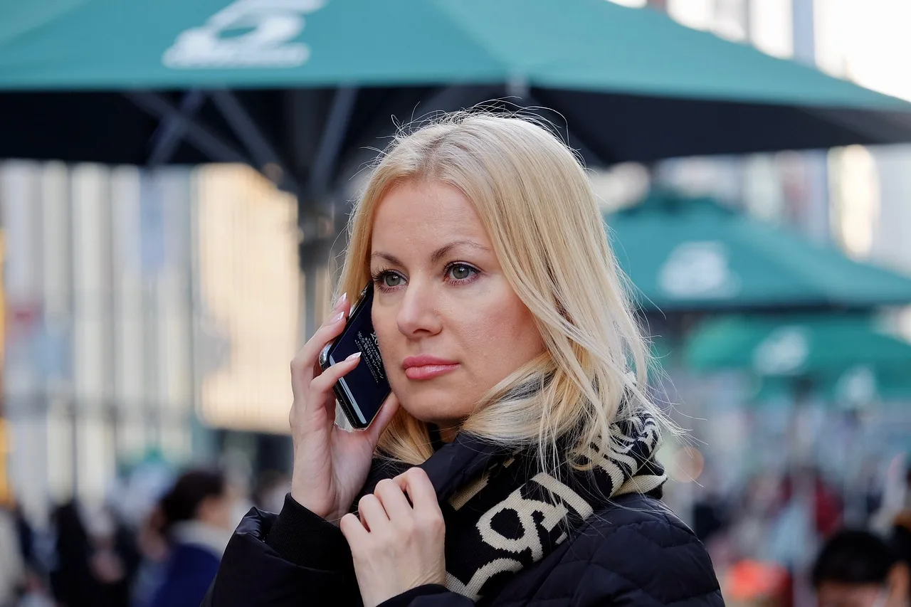 woman, smartphone, street, busy, beauty. Small Business Social Media: A 90-Day Operating Reset