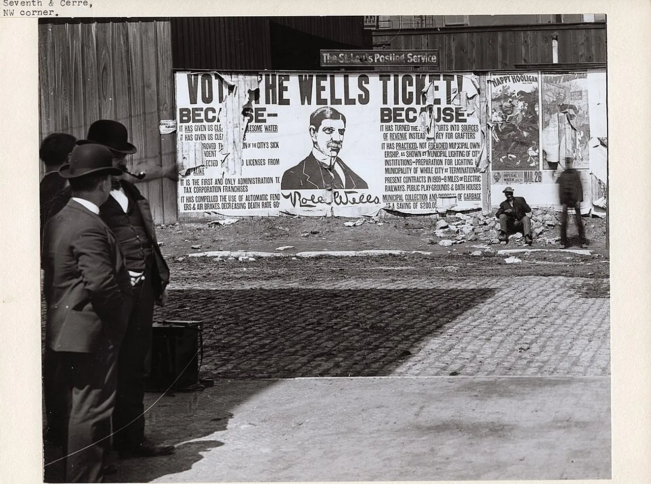 Historic street scene with a large outdoor campaign billboard in St. Louis in 1905.